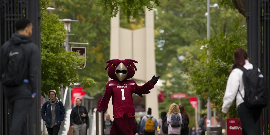 Temple's mascot Hooter the Owl posting on Polett Walk