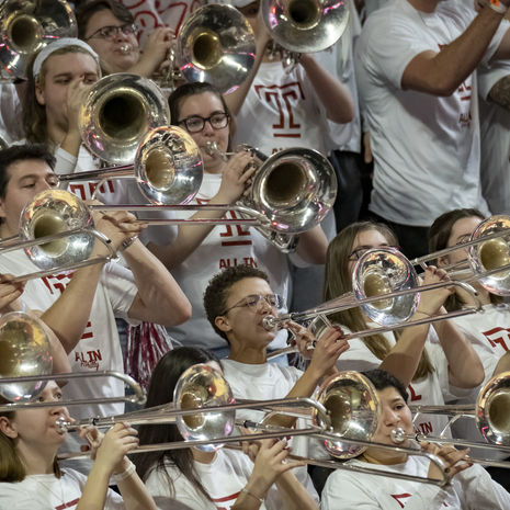 The Temple Marching Band playing at a football game