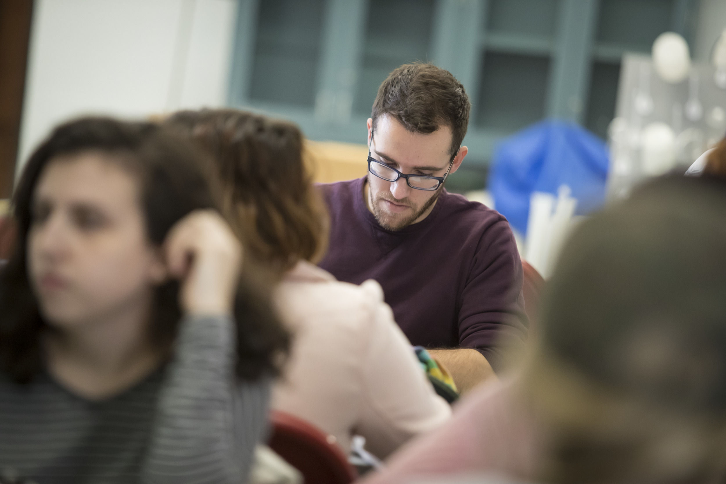 A group of Temple students are studying together.