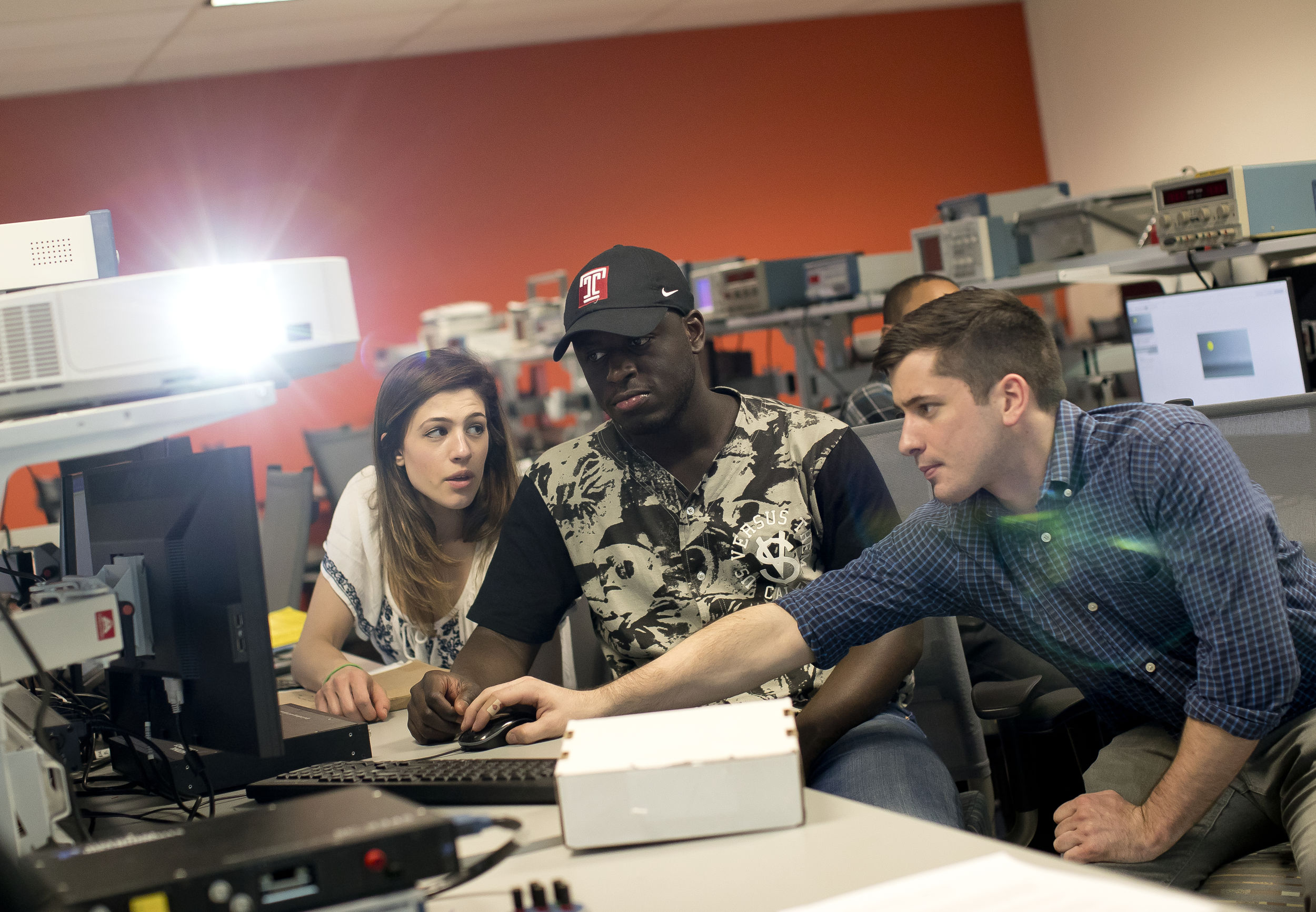 Students working together on a computer.