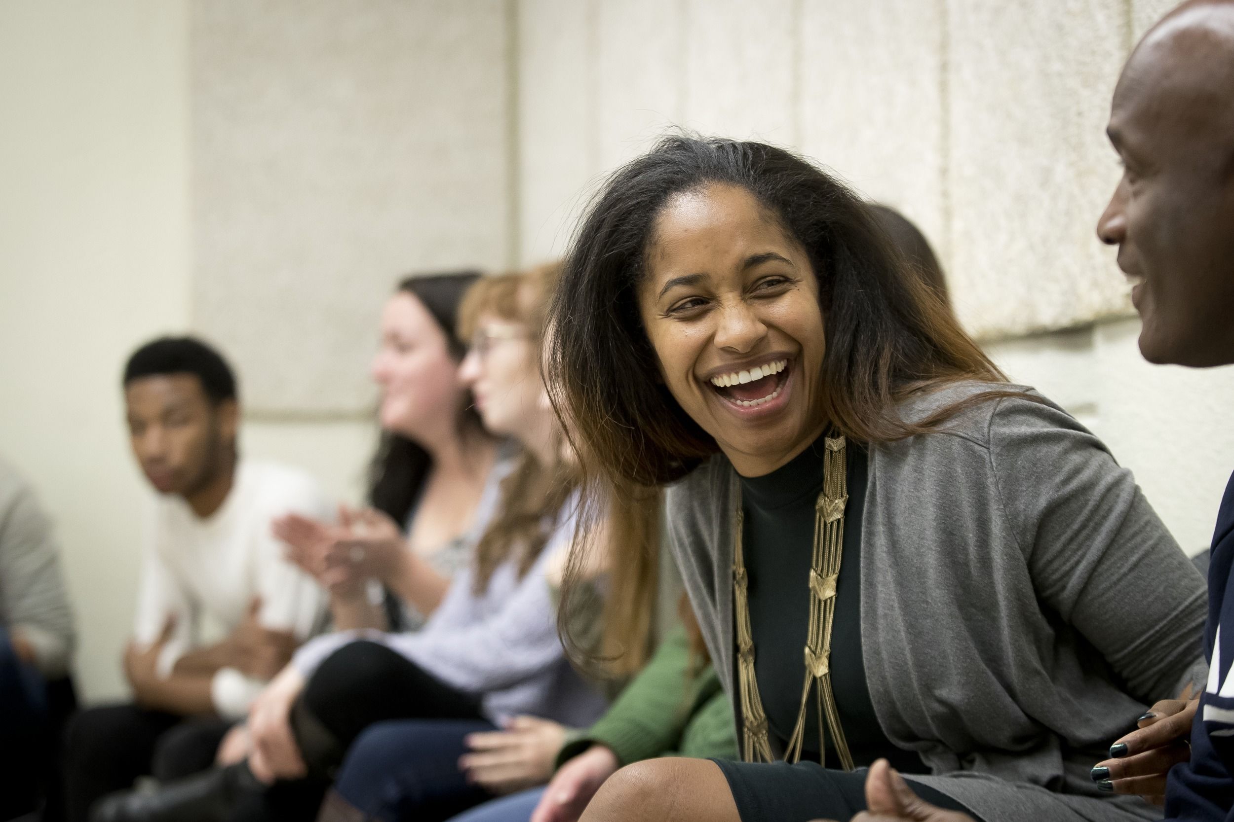 Students talk during a class at Temple.