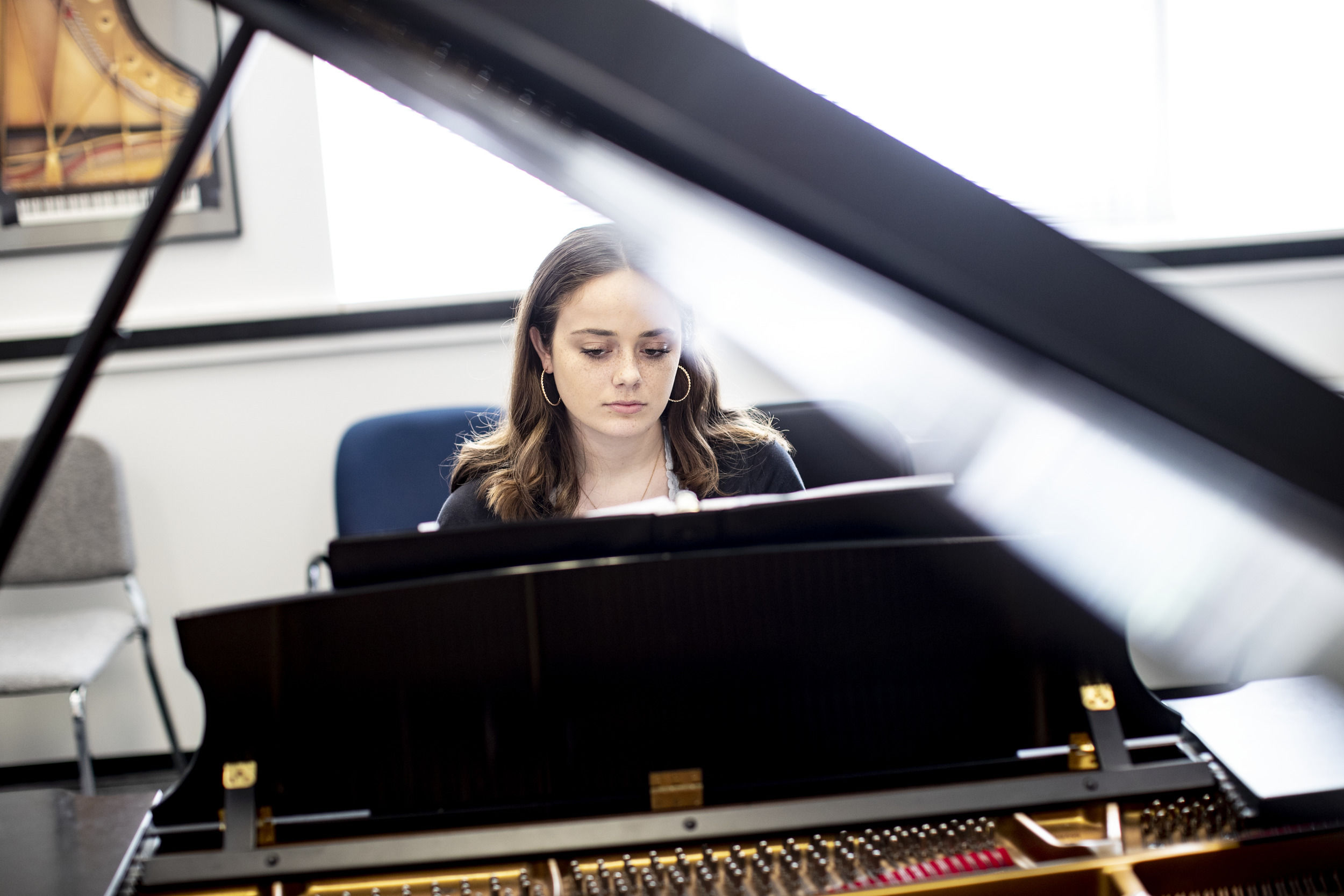 Boyer student practicing on the piano.