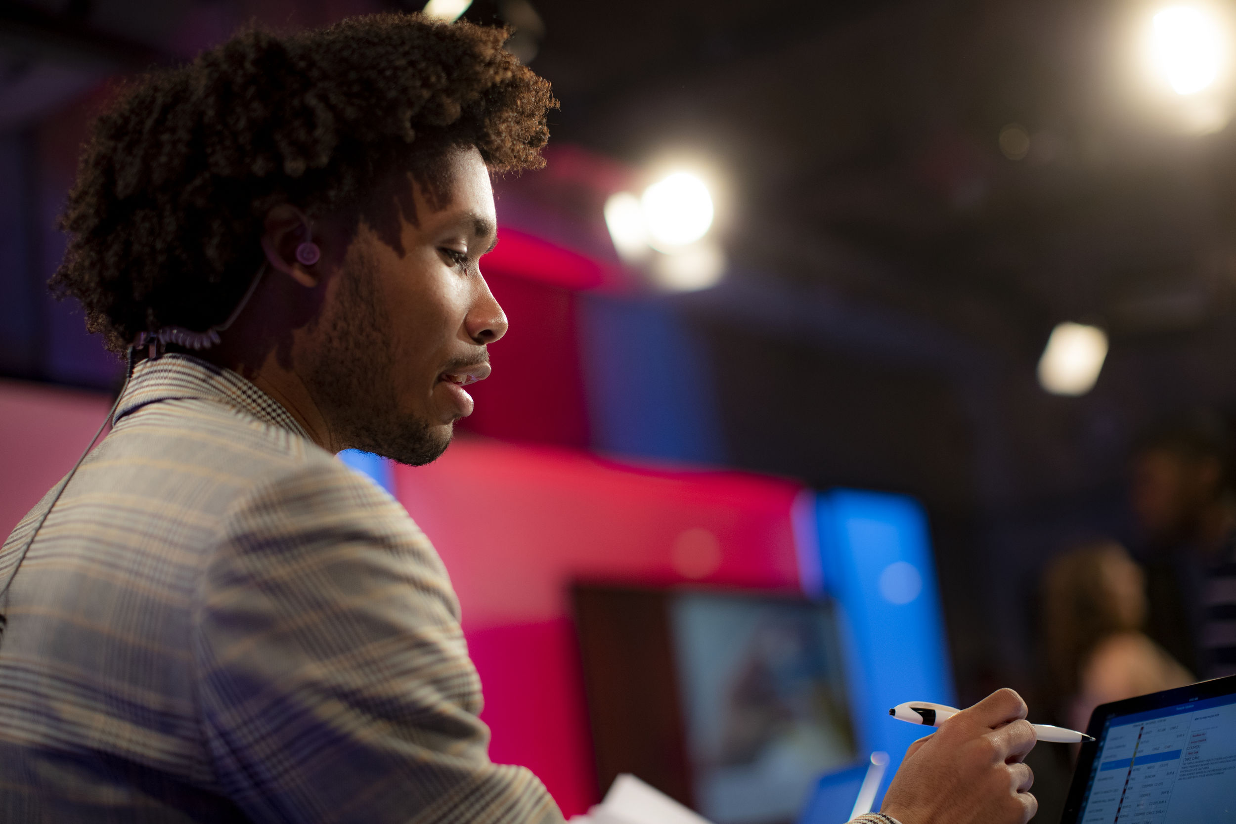 A Klein College of Media and Communications student works in the studio during a class.