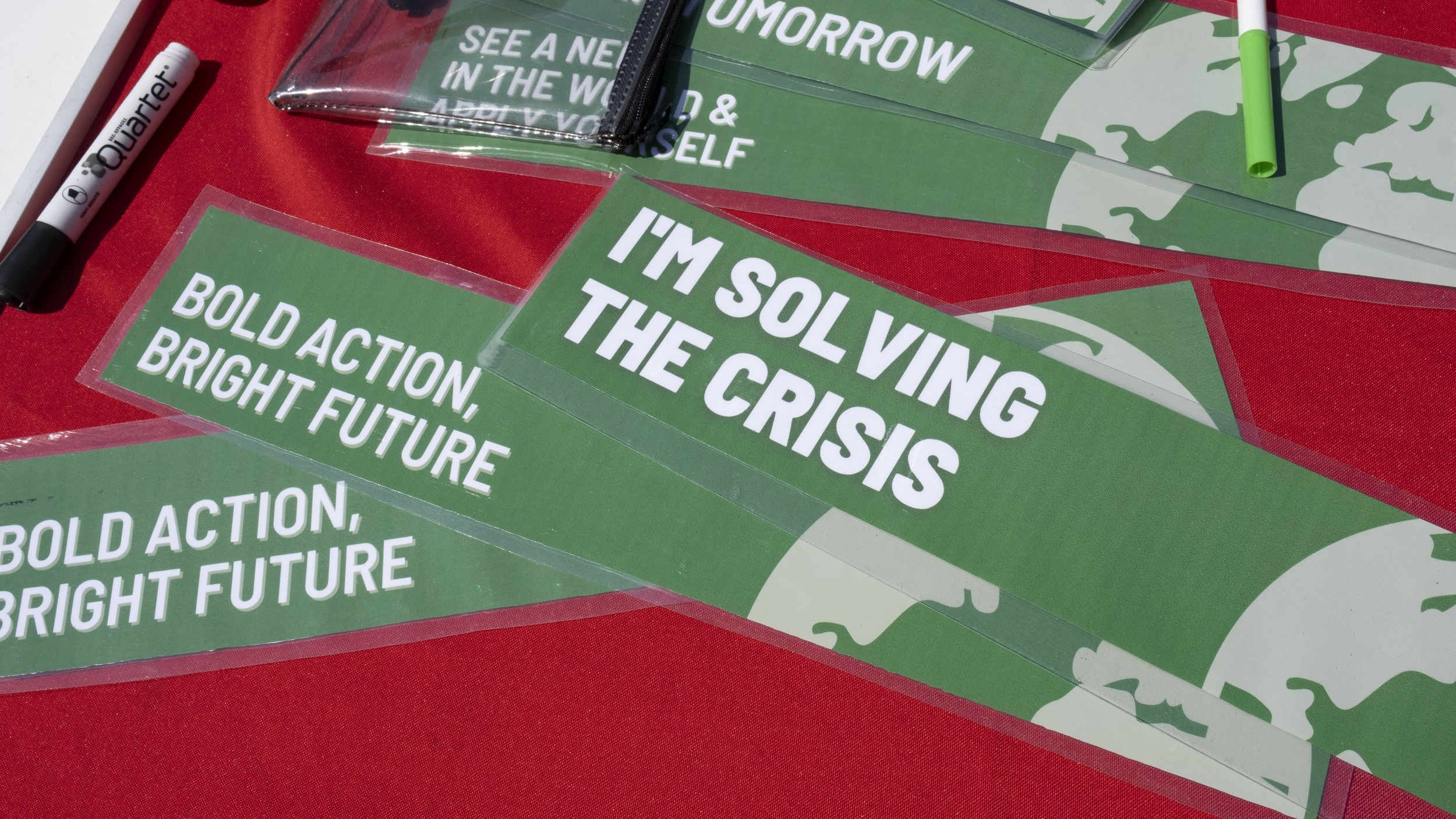 Print materials with messaging for solving climate change.