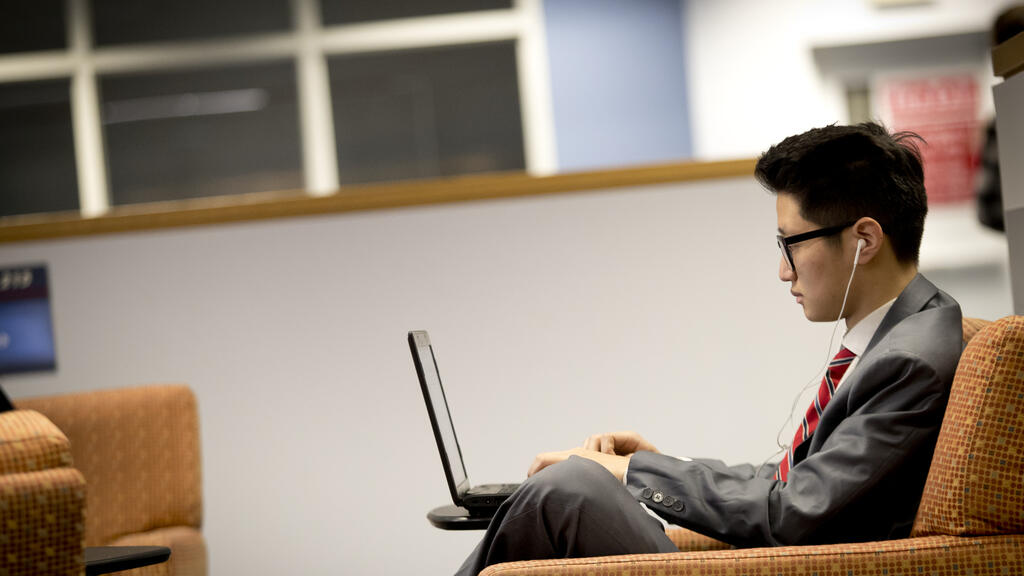 Student working on a laptop