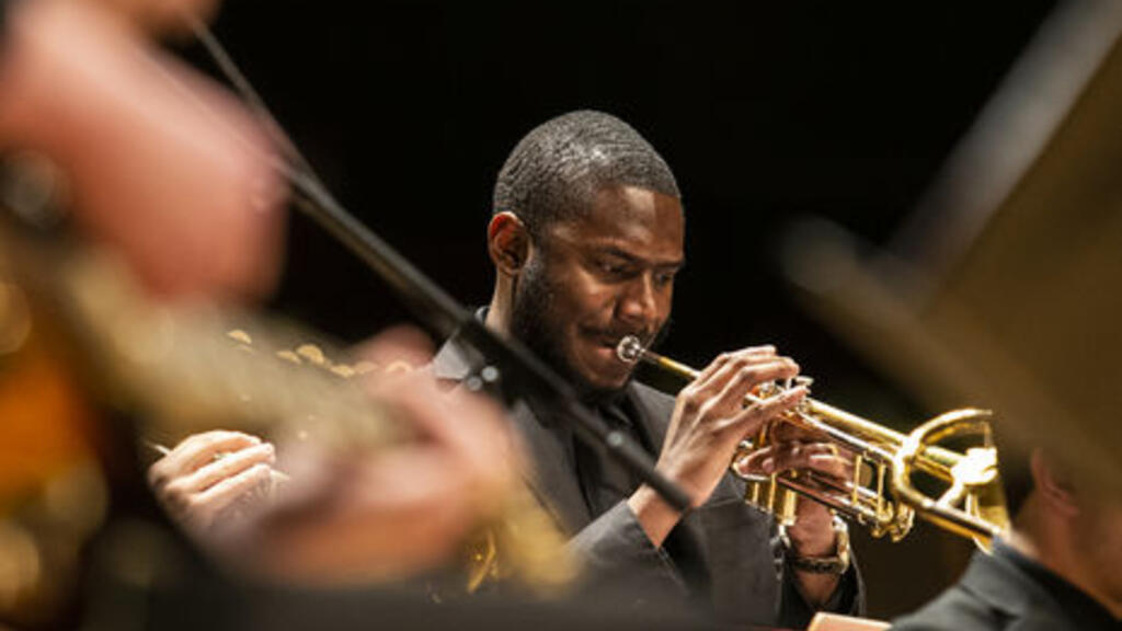 Student playing the trumpet. 