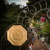 Students walk through the Polett Walk entrance.