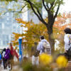 students walking across Main Campus on a fall day. 