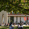 Students sitting on Beury beach. 