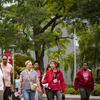 Owl Ambassador leading a tour on campus