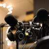 close up of the microphones in the podcast studio