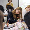 a classroom full of students working