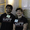 Two students smiling