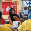 A student smiling