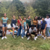 A group of several students smiling for the photo