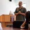 Professor Linn Washington speaks to a high school journalism class